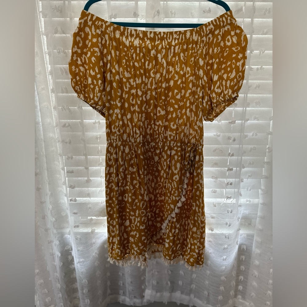 Leopard off the shoulder, tulip skirt with fringe detail. Chic Soul 1X